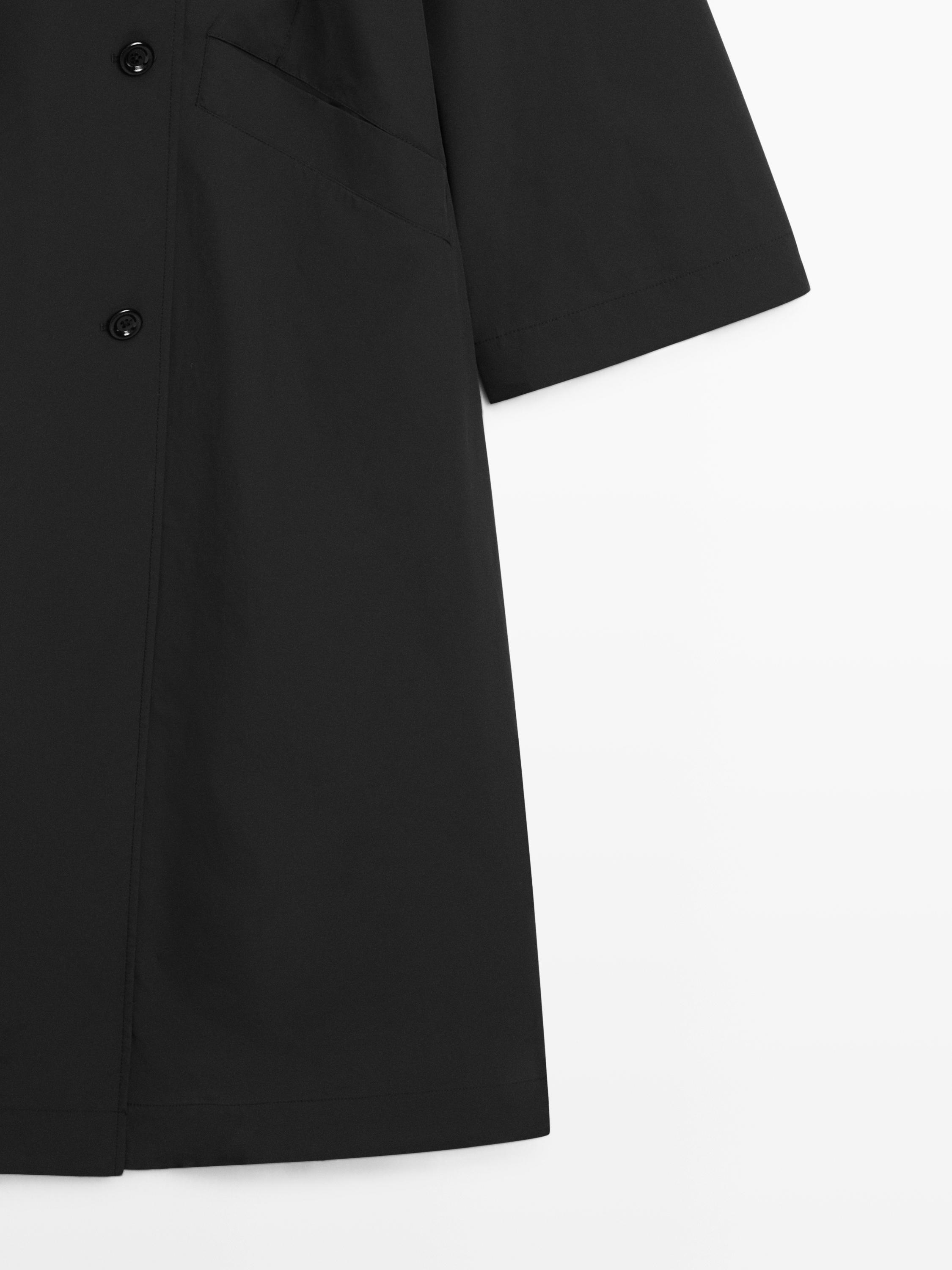 Double-breasted technical trench coat